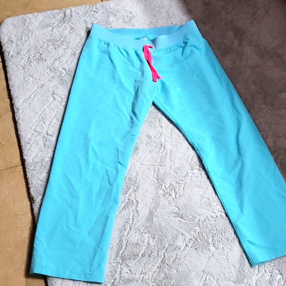 Neon blue figs scrub pants